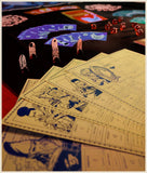 Close-up of tarot cards with colorful cardinals and a blurred background