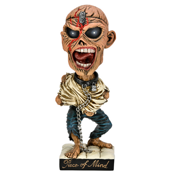 Zombie figurine with chains and 'Piece of Mind' text on a white background